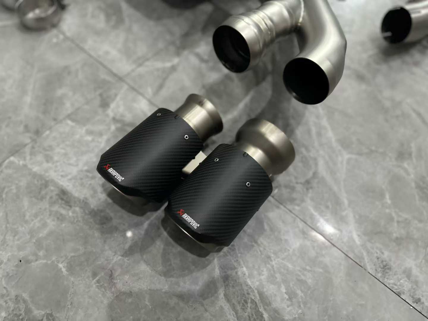 BMW X4M (F98) LCI Akrapovič Titanium Evolution Line Exhaust w/ Carbon Fiber Tips - Pre-owned